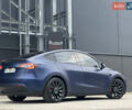 Синий Тесла Model Y, объемом двигателя 0 л и пробегом 88 тыс. км за 31990 $, фото 3 на Automoto.ua