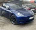 Синий Тесла Model Y, объемом двигателя 0 л и пробегом 101 тыс. км за 23999 $, фото 1 на Automoto.ua