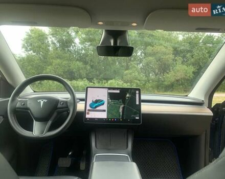 Синий Тесла Model Y, объемом двигателя 0 л и пробегом 75 тыс. км за 22900 $, фото 11 на Automoto.ua
