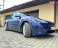 Синий Тесла Model Y, объемом двигателя 0 л и пробегом 57 тыс. км за 24300 $, фото 1 на Automoto.ua