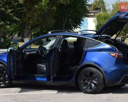 Синий Тесла Model Y, объемом двигателя 0 л и пробегом 81 тыс. км за 25499 $, фото 17 на Automoto.ua