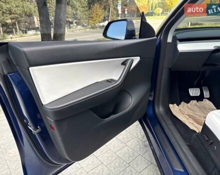 Синій Тесла Model Y, об'ємом двигуна 0 л та пробігом 88 тис. км за 22999 $, фото 40 на Automoto.ua