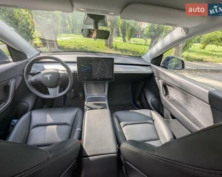 Синий Тесла Model Y, объемом двигателя 0 л и пробегом 103 тыс. км за 22190 $, фото 5 на Automoto.ua