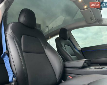 Синий Тесла Model Y, объемом двигателя 0 л и пробегом 88 тыс. км за 31990 $, фото 39 на Automoto.ua