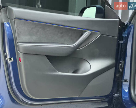 Синий Тесла Model Y, объемом двигателя 0 л и пробегом 88 тыс. км за 31990 $, фото 25 на Automoto.ua