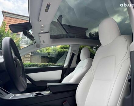 Синій Тесла Model Y, об'ємом двигуна 0 л та пробігом 86 тис. км за 19390 $, фото 17 на Automoto.ua