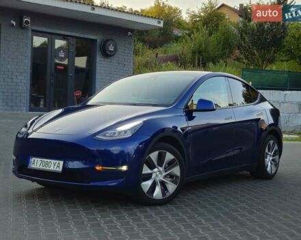 Синий Тесла Model Y, объемом двигателя 0 л и пробегом 99 тыс. км за 25900 $, фото 1 на Automoto.ua