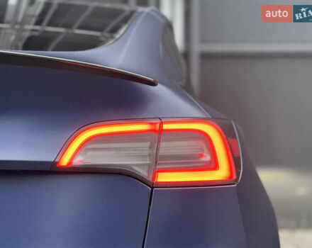 Синий Тесла Model Y, объемом двигателя 0 л и пробегом 88 тыс. км за 31990 $, фото 19 на Automoto.ua