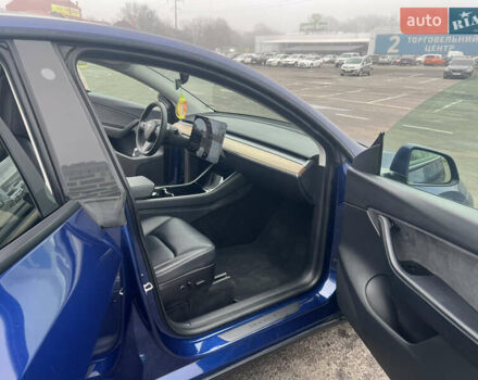 Синий Тесла Model Y, объемом двигателя 0 л и пробегом 125 тыс. км за 25997 $, фото 20 на Automoto.ua