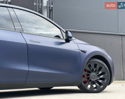 Синий Тесла Model Y, объемом двигателя 0 л и пробегом 88 тыс. км за 31990 $, фото 4 на Automoto.ua