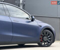 Синий Тесла Model Y, объемом двигателя 0 л и пробегом 88 тыс. км за 31990 $, фото 4 на Automoto.ua
