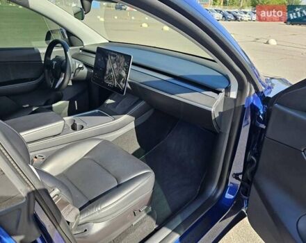 Синий Тесла Model Y, объемом двигателя 0 л и пробегом 53 тыс. км за 23500 $, фото 26 на Automoto.ua