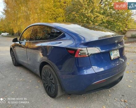 Синий Тесла Model Y, объемом двигателя 0 л и пробегом 58 тыс. км за 24000 $, фото 1 на Automoto.ua