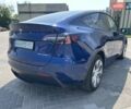 Синий Тесла Model Y, объемом двигателя 0 л и пробегом 61 тыс. км за 26500 $, фото 1 на Automoto.ua