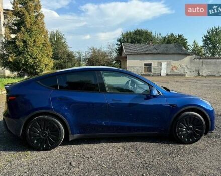 Синий Тесла Model Y, объемом двигателя 0 л и пробегом 72 тыс. км за 24800 $, фото 1 на Automoto.ua