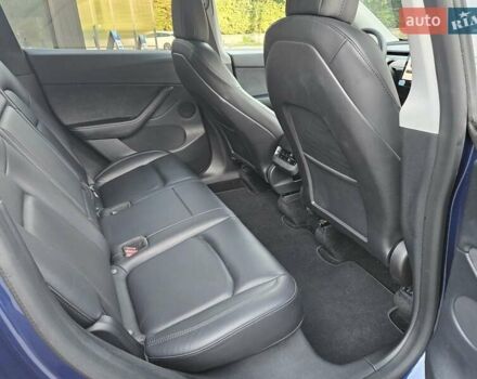 Синий Тесла Model Y, объемом двигателя 0 л и пробегом 99 тыс. км за 25900 $, фото 17 на Automoto.ua