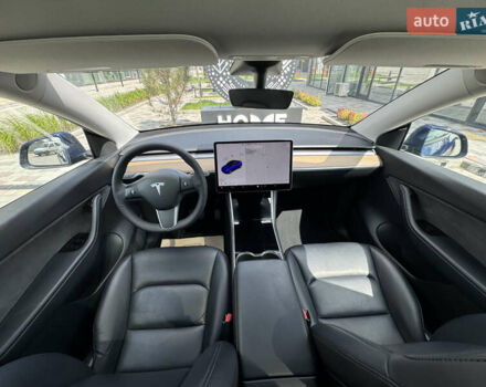 Синий Тесла Model Y, объемом двигателя 0 л и пробегом 83 тыс. км за 24999 $, фото 11 на Automoto.ua
