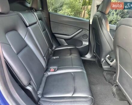 Синий Тесла Model Y, объемом двигателя 0 л и пробегом 90 тыс. км за 22300 $, фото 16 на Automoto.ua