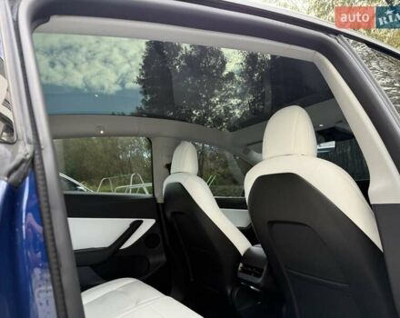 Синий Тесла Model Y, объемом двигателя 0 л и пробегом 86 тыс. км за 25900 $, фото 89 на Automoto.ua