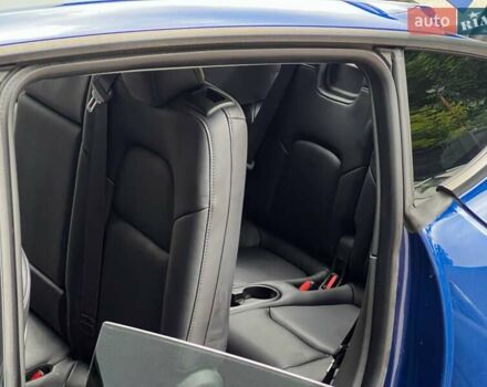 Синий Тесла Model Y, объемом двигателя 0 л и пробегом 66 тыс. км за 25500 $, фото 17 на Automoto.ua