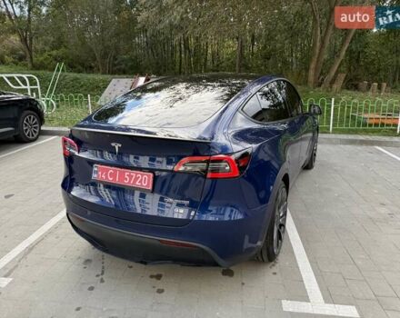 Синий Тесла Model Y, объемом двигателя 0 л и пробегом 86 тыс. км за 25900 $, фото 51 на Automoto.ua