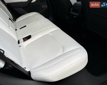 Синий Тесла Model Y, объемом двигателя 0 л и пробегом 87 тыс. км за 23999 $, фото 42 на Automoto.ua