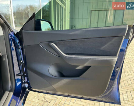 Синий Тесла Model Y, объемом двигателя 0 л и пробегом 35 тыс. км за 30100 $, фото 23 на Automoto.ua