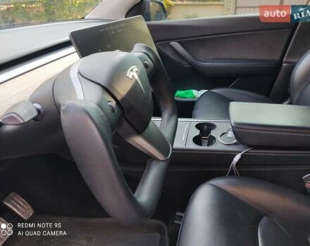 Синий Тесла Model Y, объемом двигателя 0 л и пробегом 58 тыс. км за 24000 $, фото 10 на Automoto.ua