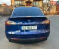 Синий Тесла Model Y, объемом двигателя 0 л и пробегом 62 тыс. км за 25800 $, фото 2 на Automoto.ua