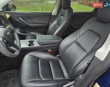 Синий Тесла Model Y, объемом двигателя 0 л и пробегом 99 тыс. км за 25500 $, фото 33 на Automoto.ua