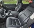 Синий Тесла Model Y, объемом двигателя 0 л и пробегом 99 тыс. км за 25500 $, фото 33 на Automoto.ua