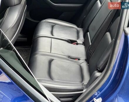 Синий Тесла Model Y, объемом двигателя 0 л и пробегом 66 тыс. км за 25500 $, фото 14 на Automoto.ua