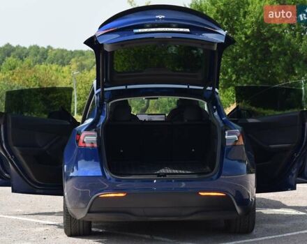 Синий Тесла Model Y, объемом двигателя 0 л и пробегом 81 тыс. км за 25499 $, фото 18 на Automoto.ua