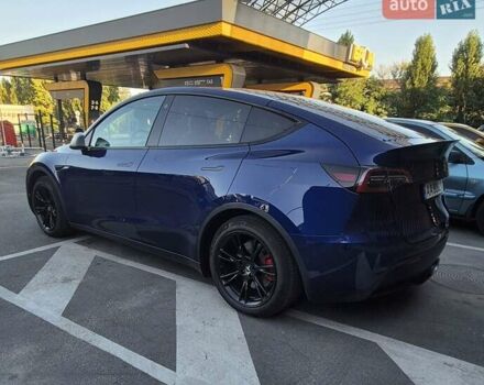 Синий Тесла Model Y, объемом двигателя 0 л и пробегом 69 тыс. км за 26500 $, фото 1 на Automoto.ua