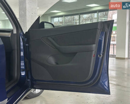 Синий Тесла Model Y, объемом двигателя 0 л и пробегом 122 тыс. км за 27500 $, фото 23 на Automoto.ua