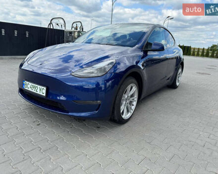 Синий Тесла Model Y, объемом двигателя 0 л и пробегом 53 тыс. км за 25000 $, фото 1 на Automoto.ua