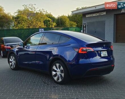 Синий Тесла Model Y, объемом двигателя 0 л и пробегом 99 тыс. км за 25900 $, фото 5 на Automoto.ua