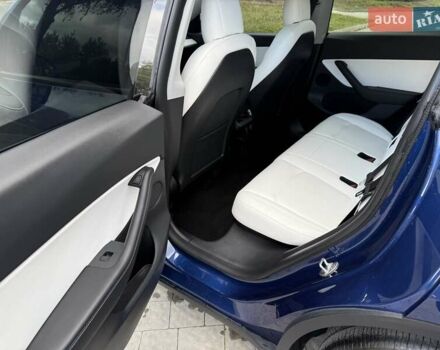 Синій Тесла Model Y, об'ємом двигуна 0 л та пробігом 88 тис. км за 22999 $, фото 38 на Automoto.ua