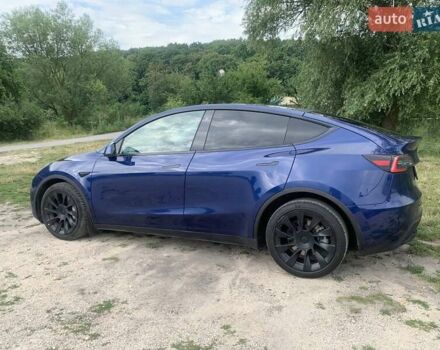 Синий Тесла Model Y, объемом двигателя 0 л и пробегом 75 тыс. км за 22900 $, фото 4 на Automoto.ua