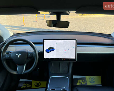 Синий Тесла Model Y, объемом двигателя 0 л и пробегом 72 тыс. км за 25750 $, фото 14 на Automoto.ua