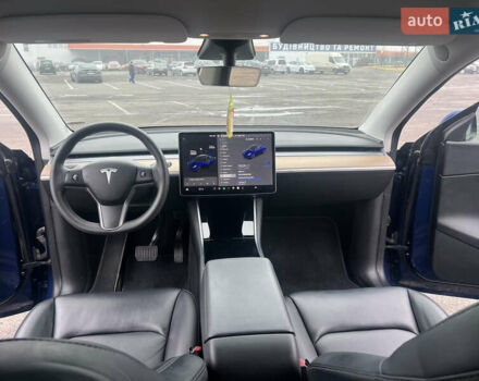 Синий Тесла Model Y, объемом двигателя 0 л и пробегом 125 тыс. км за 25997 $, фото 5 на Automoto.ua