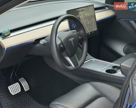 Синий Тесла Model Y, объемом двигателя 0 л и пробегом 88 тыс. км за 31990 $, фото 30 на Automoto.ua