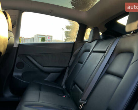 Синий Тесла Model Y, объемом двигателя 0 л и пробегом 72 тыс. км за 25750 $, фото 19 на Automoto.ua