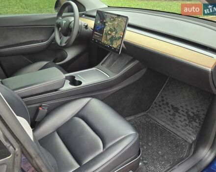 Синий Тесла Model Y, объемом двигателя 0 л и пробегом 99 тыс. км за 25500 $, фото 22 на Automoto.ua