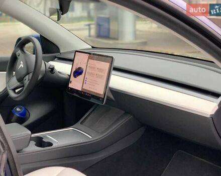 Синий Тесла Model Y, объемом двигателя 0 л и пробегом 130 тыс. км за 23500 $, фото 10 на Automoto.ua