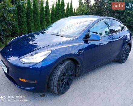 Синий Тесла Model Y, объемом двигателя 0 л и пробегом 69 тыс. км за 24900 $, фото 1 на Automoto.ua