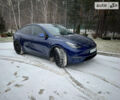 Синий Тесла Model Y, объемом двигателя 0 л и пробегом 66 тыс. км за 25000 $, фото 1 на Automoto.ua