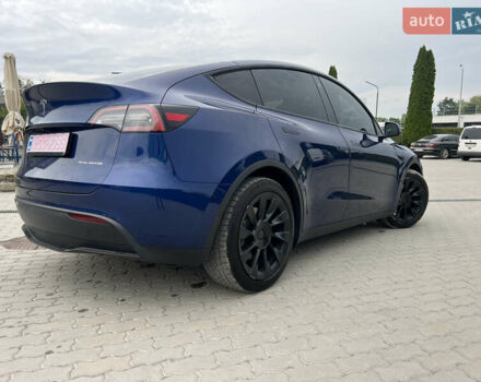 Синий Тесла Model Y, объемом двигателя 0 л и пробегом 116 тыс. км за 24500 $, фото 1 на Automoto.ua