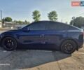 Синий Тесла Model Y, объемом двигателя 0 л и пробегом 106 тыс. км за 16000 $, фото 1 на Automoto.ua