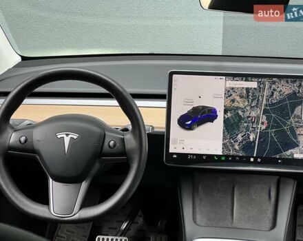 Синий Тесла Model Y, объемом двигателя 0 л и пробегом 66 тыс. км за 25500 $, фото 19 на Automoto.ua